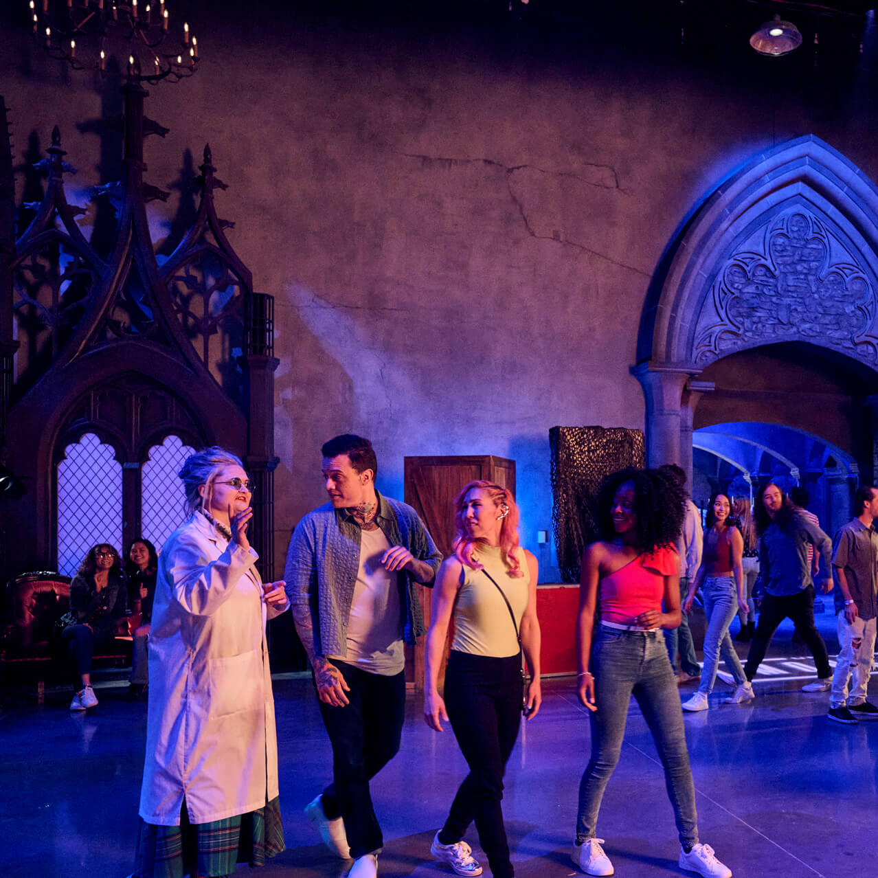 Guests walking through a gothic-themed haunted house experience at Universal Horror Unleashed.