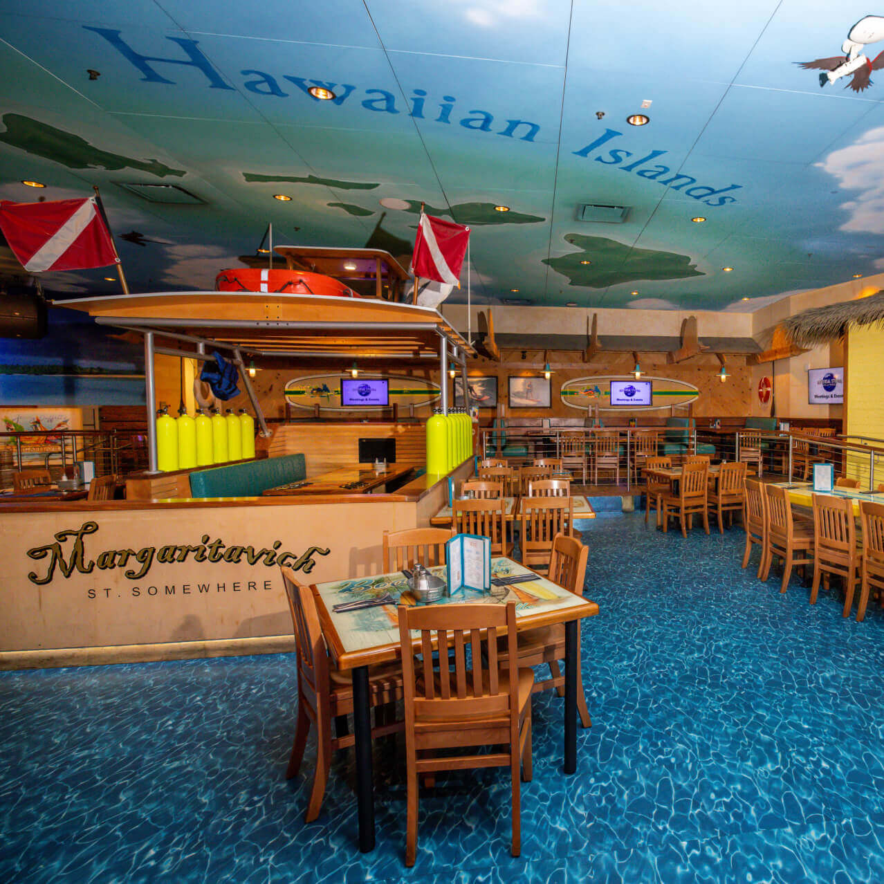 Surfboard tables inside of Jimmy Buffet’s Margaritaville.