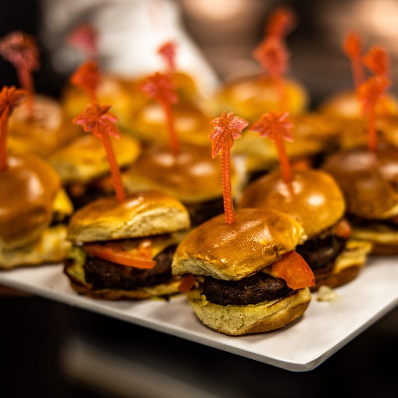 A buffet of burgers on a plate