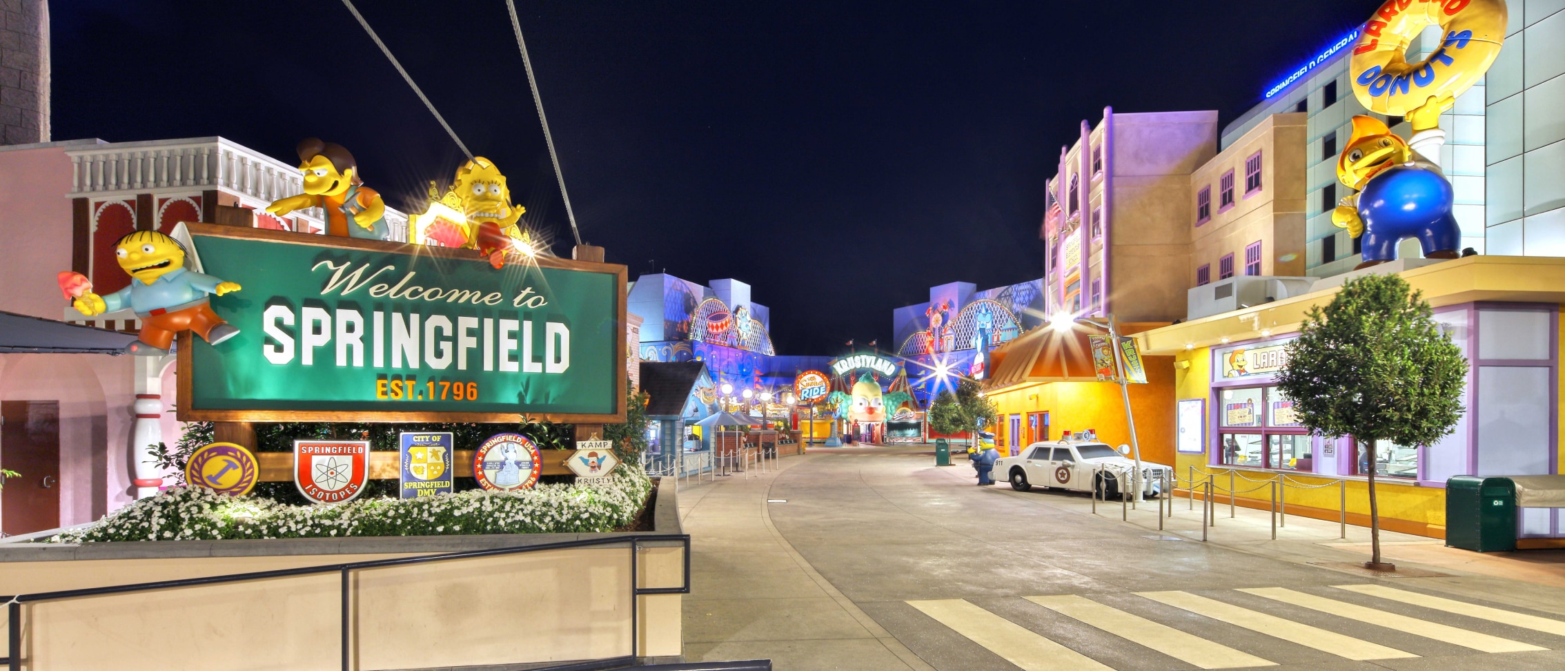A sign that says Welcome to Springfield with Springfield in the background.