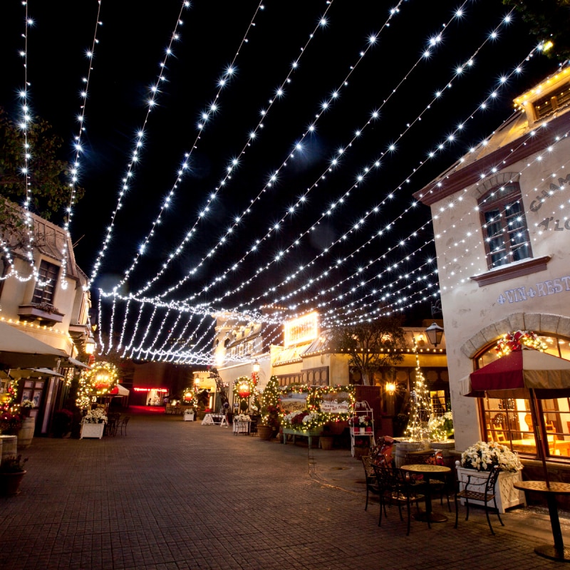White string lights hanging above Streets of the World at Universal Studios Hollywood.
