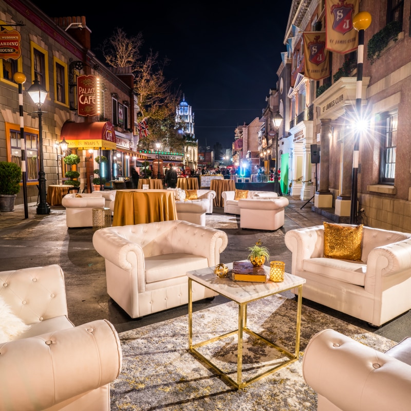 Couches and tables set up for an event at Pets Place inside Universal Studios Hollywood.