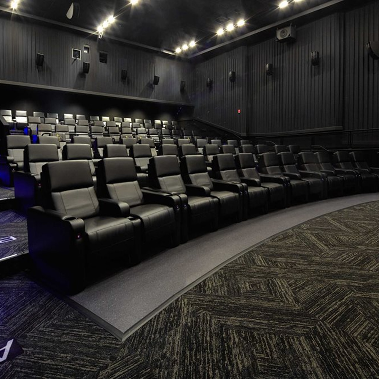 stadium seating at one of the universal cinema theaters