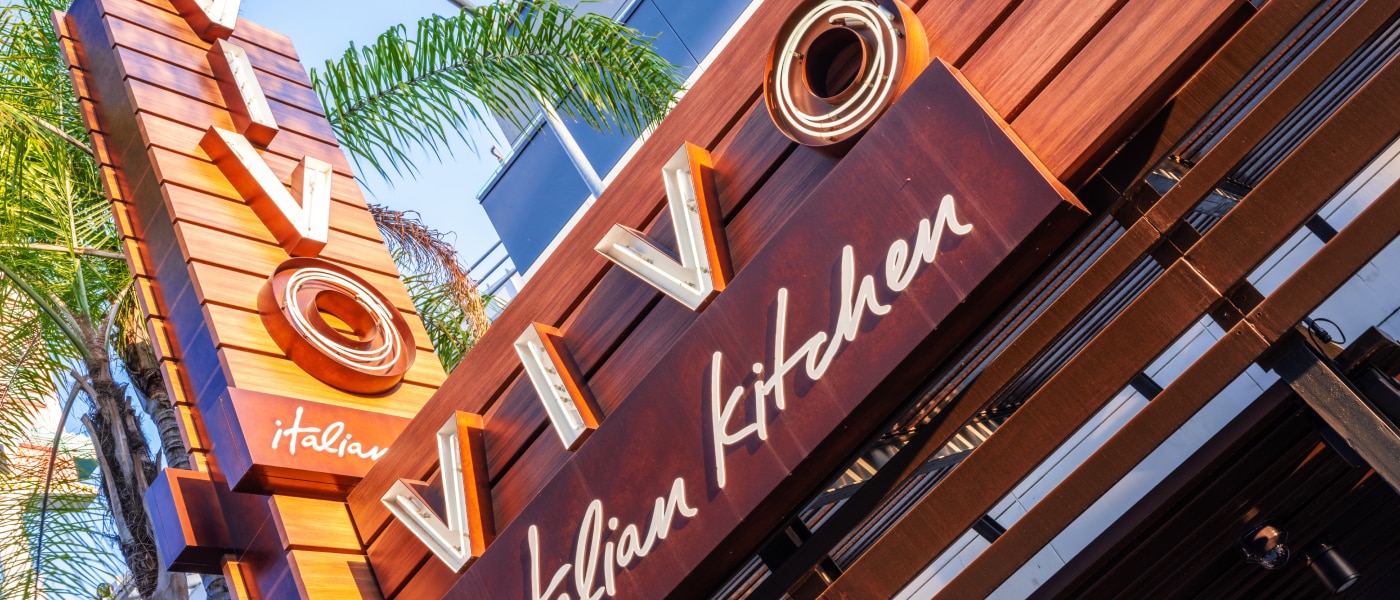 The signage above the front entrance to VIVO Italian Kitchen.