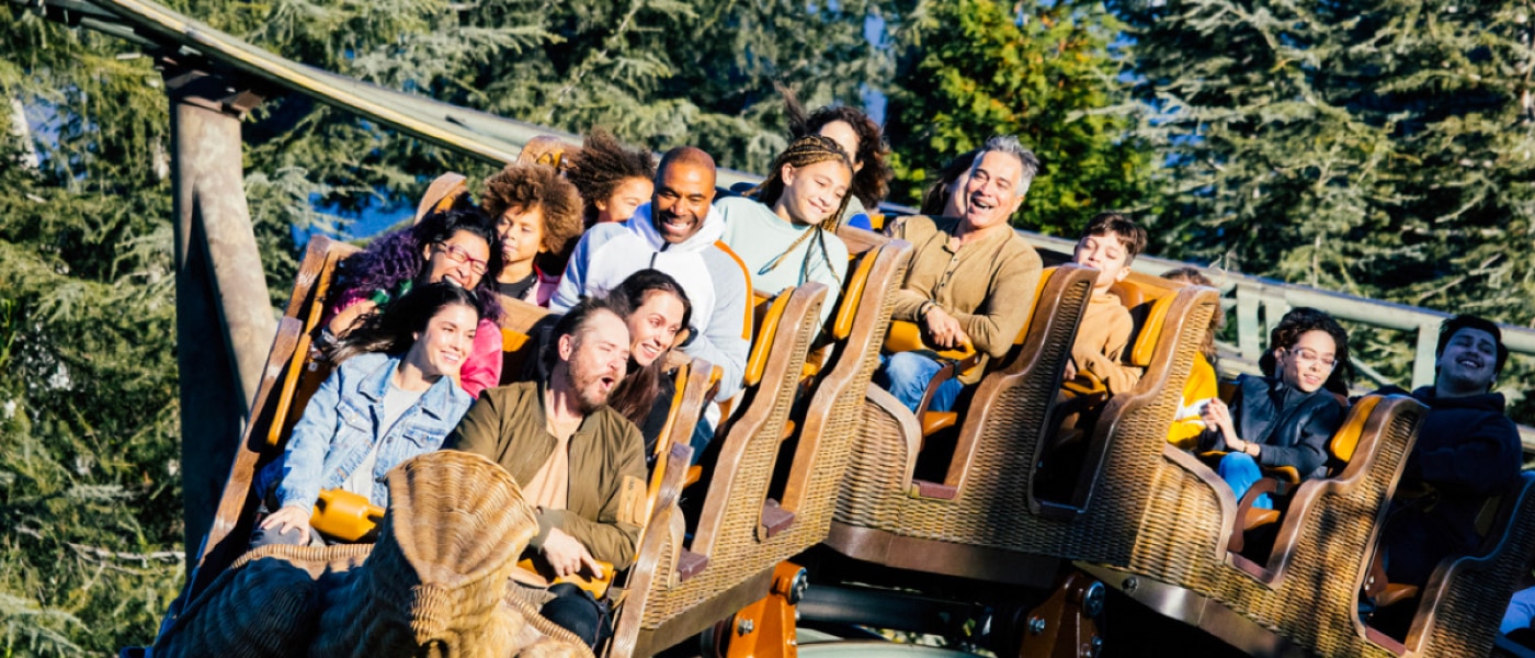 A cart full of excited guests riding the Flight of the Hippogriff at Universal Studios Hollywood.