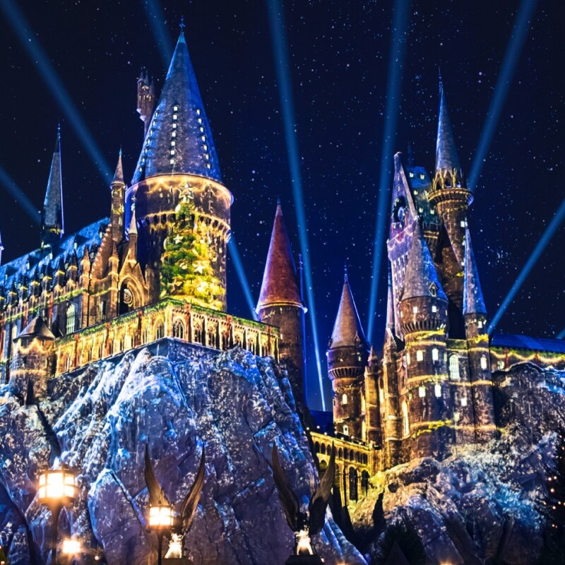 Hogwarts Castle lit up for Christmas at The Wizarding World of Harry Potter.
