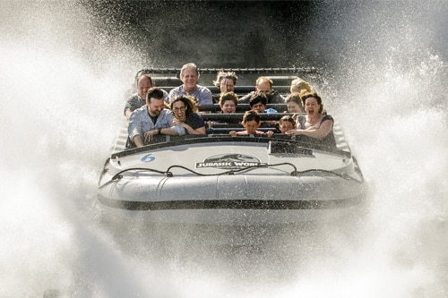 Guests enjoying Jurassic World the Ride