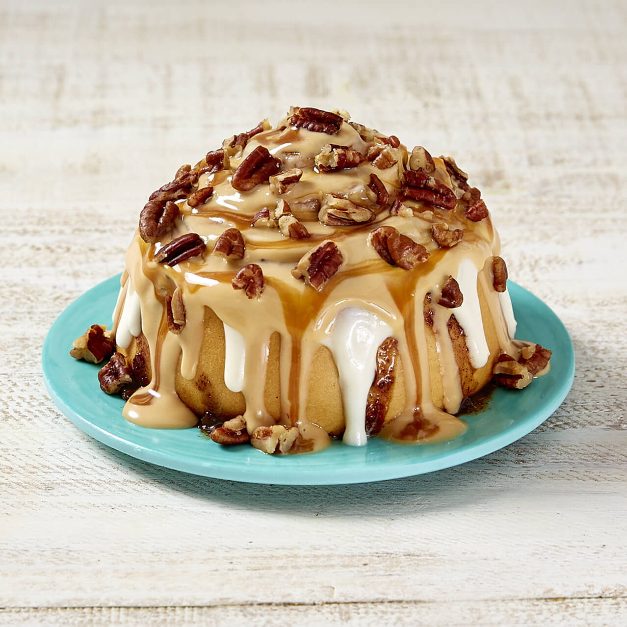 A Caramel PecanBon® cinnamon roll from Cinnabon, a bakery.