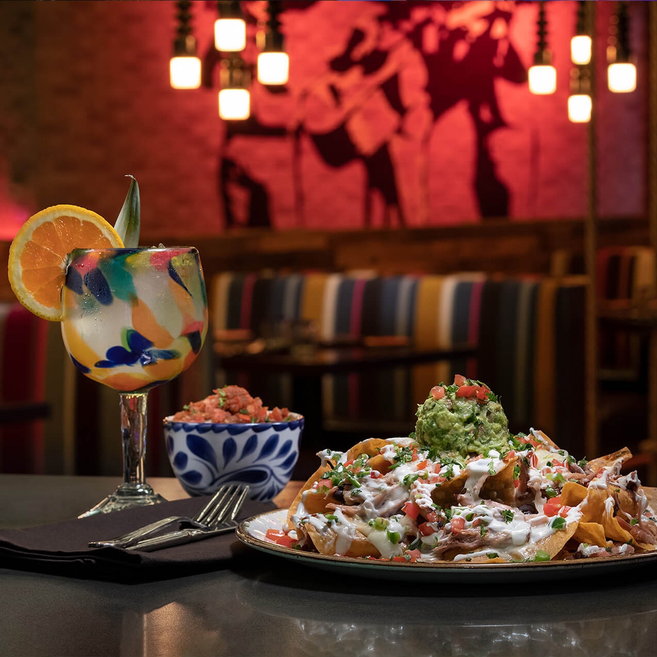 Chips and a drink at Antojitos