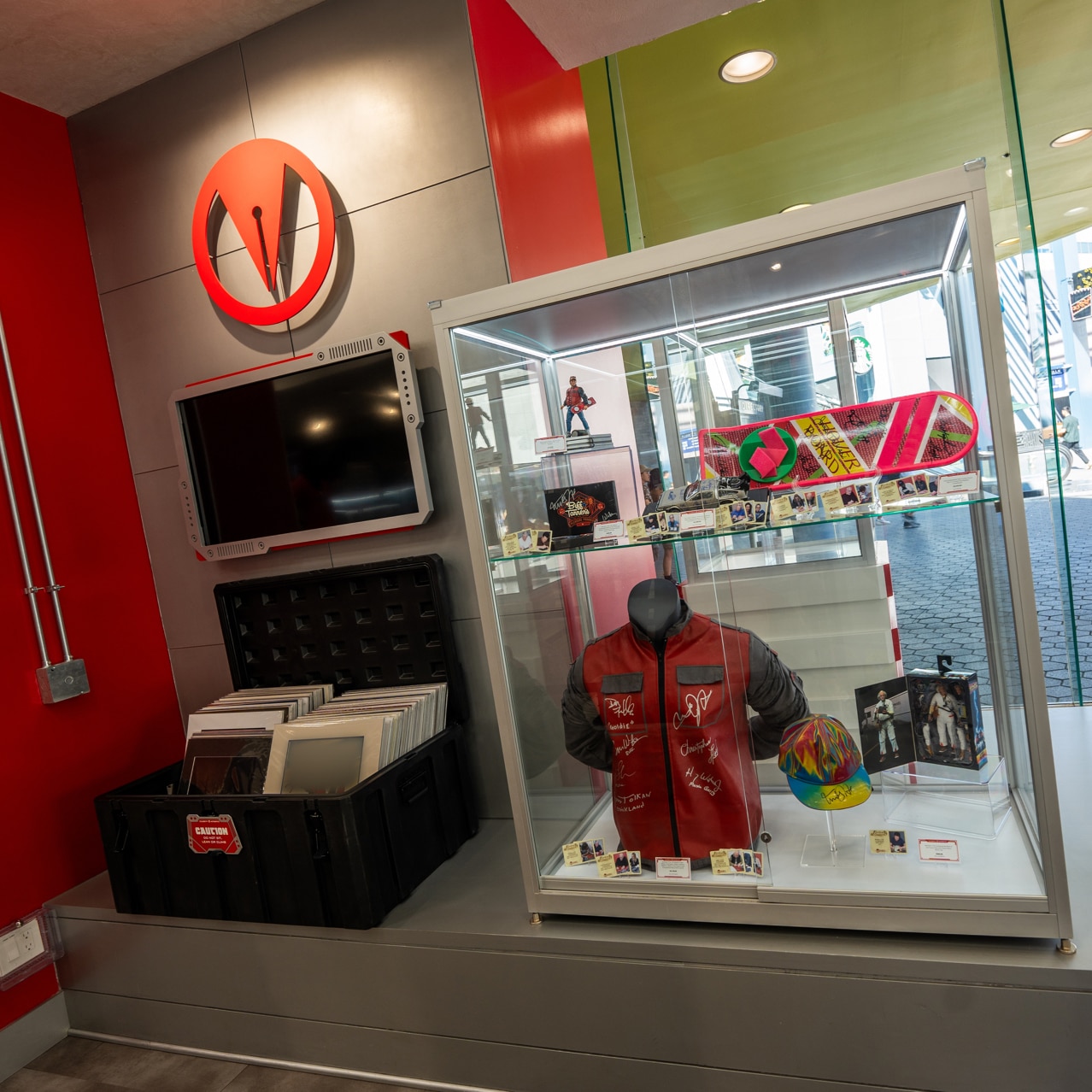 A glass case featuring collectibles from Back to the Future in Celebrity Authentics at Universal CityWalk Hollywood.
