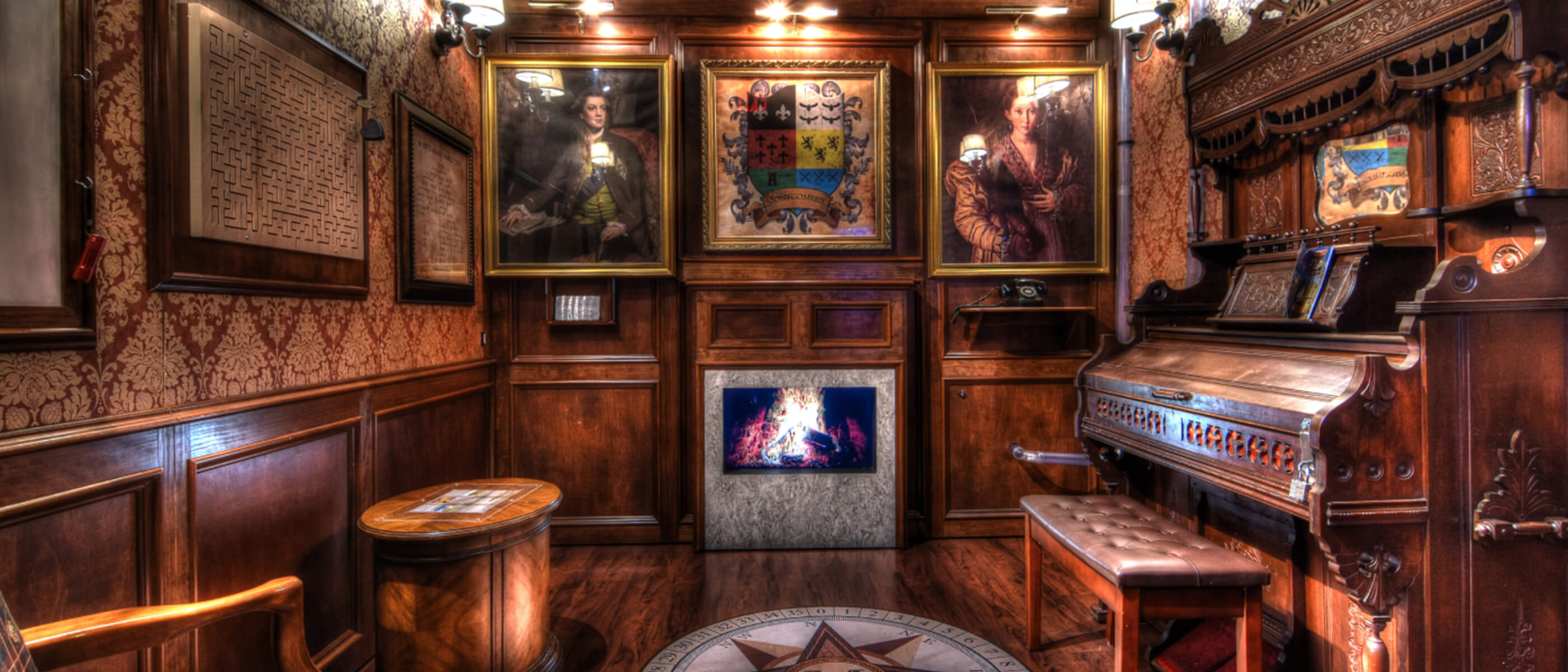 A historical-looking room with wooden walls and flooring, a wooden piano, and intricate art works on the walls.