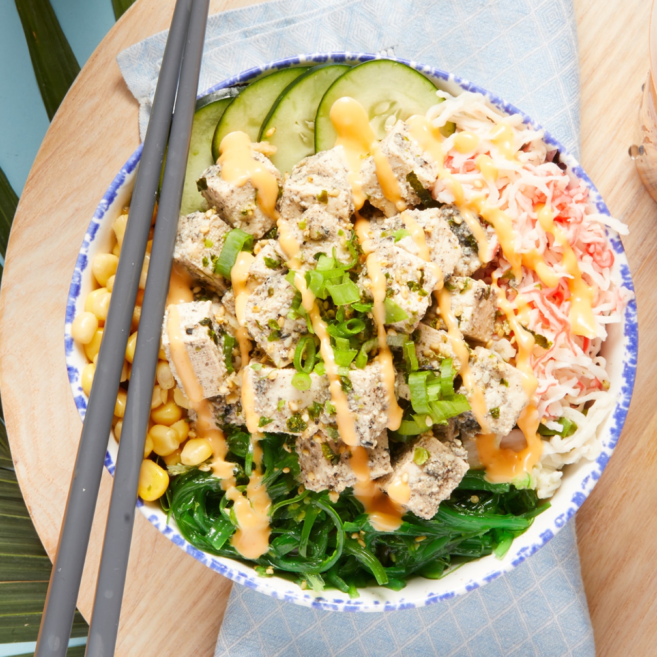 A poke bowl and chopsticks from Uncle Sharkii Poke Bar® at Universal CityWalk Hollywood.