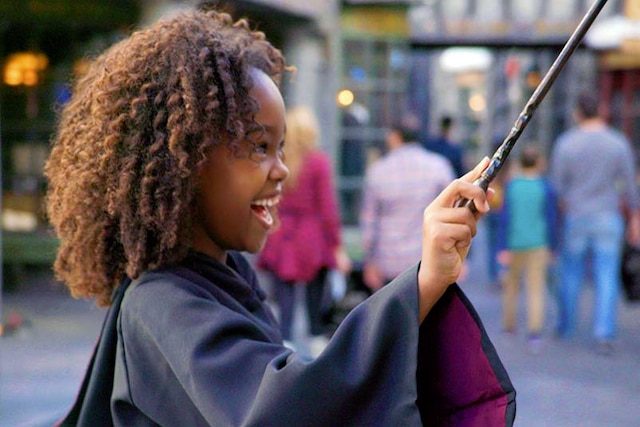 Girl using interactive Wand Girl using interactive Wand