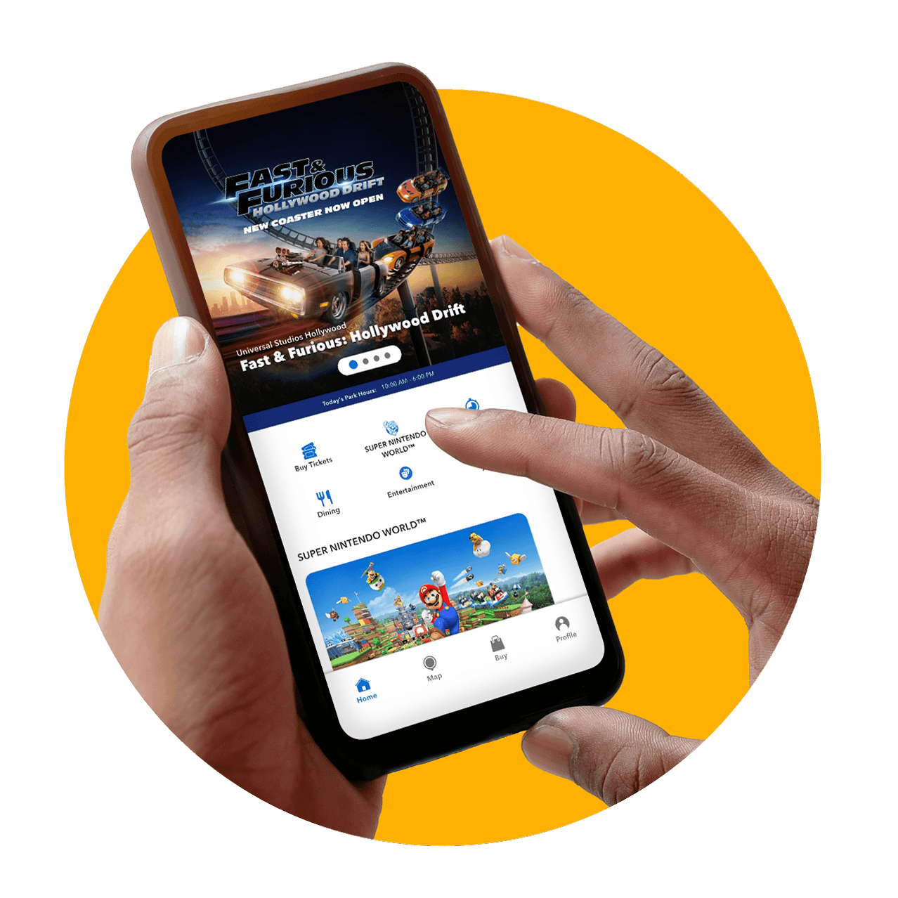 Hands holding a smartphone displaying the Universal Studios Hollywood app homepage, featuring Fast & Furious: Hollywood Drift.