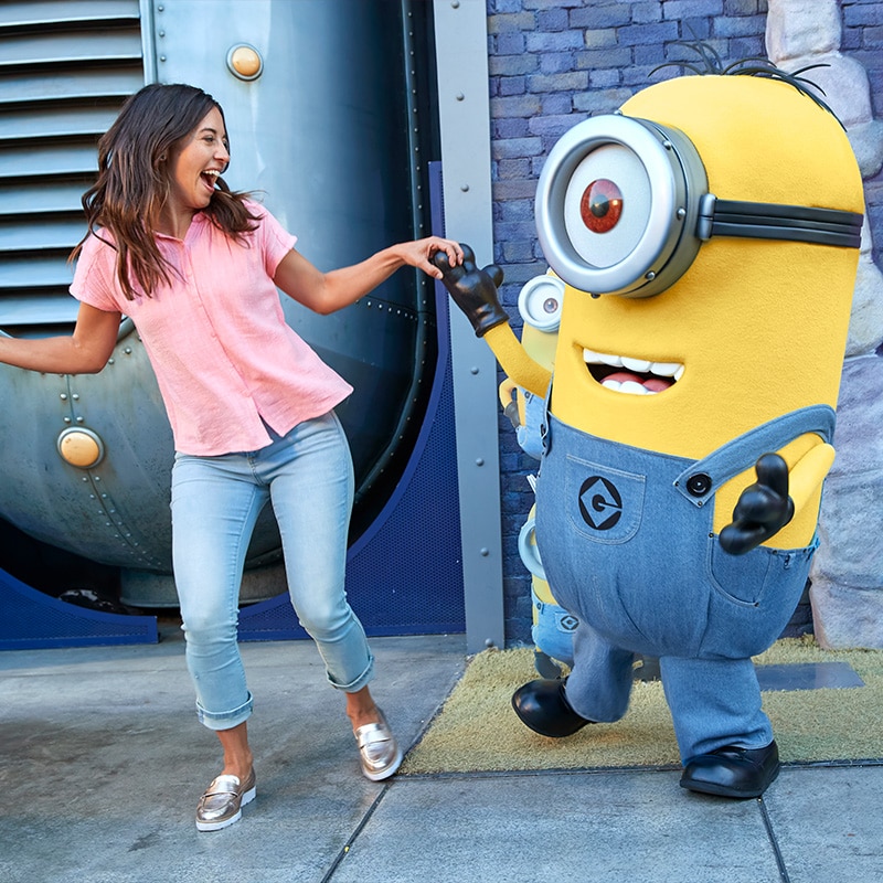 Minion dancing with a guest
