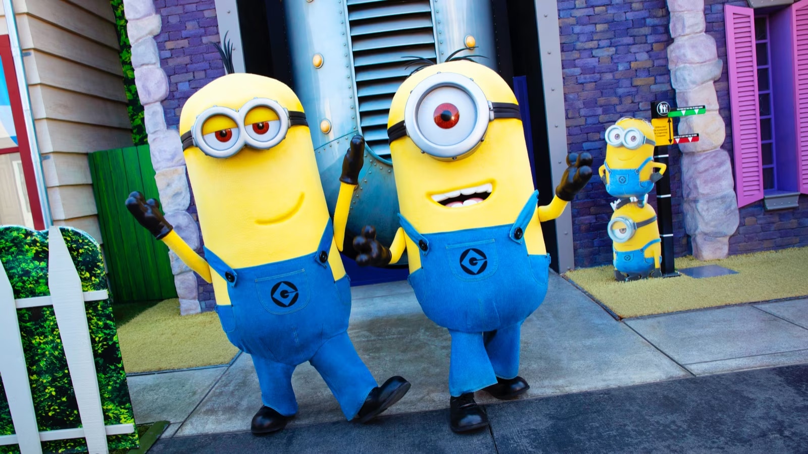 Two minions posing