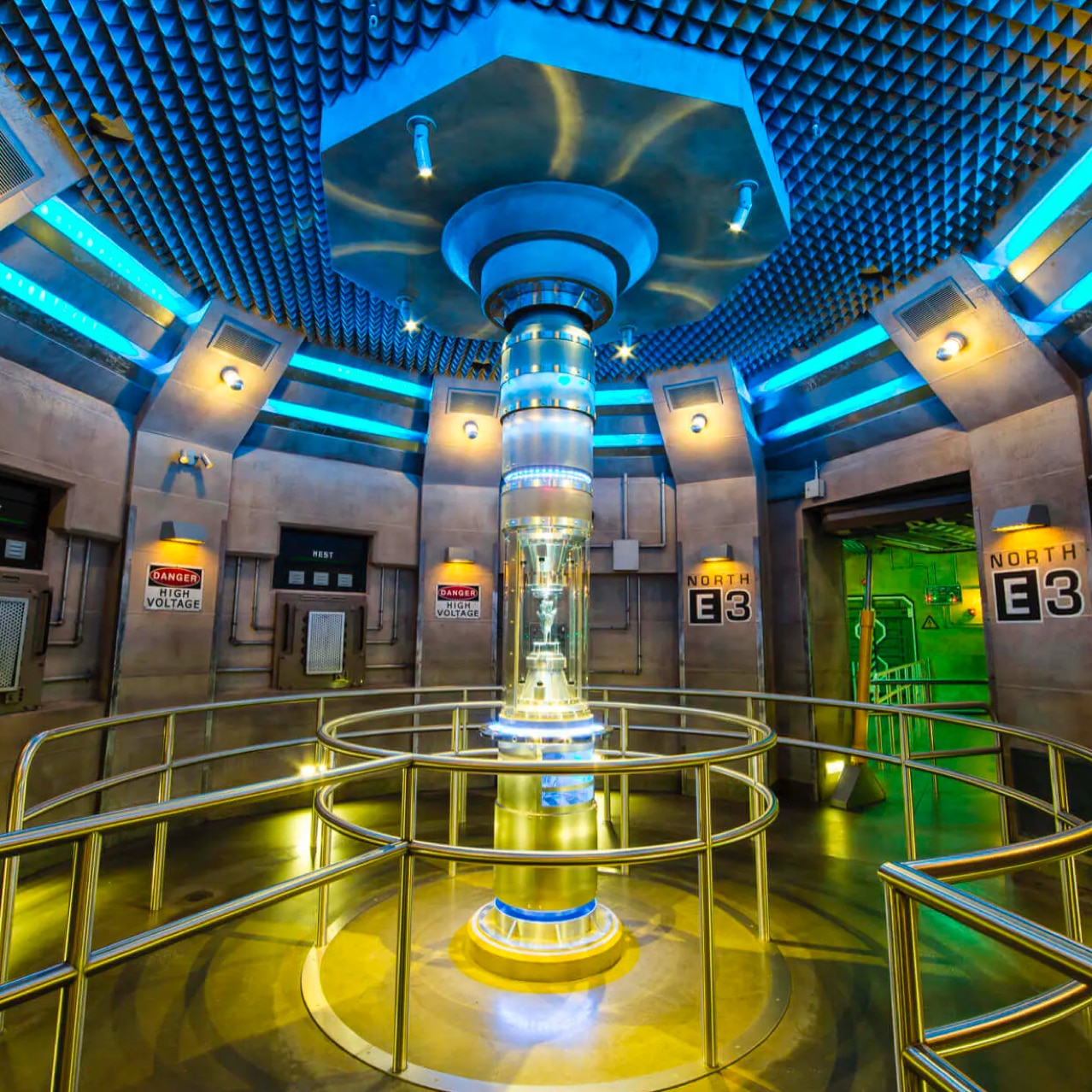 A piece of the AllSpark from the TRANSFORMERS movies sits in a tubular display case in the queue for TRANSFORMERS: The Ride 3D at Universal Studios Orlando.