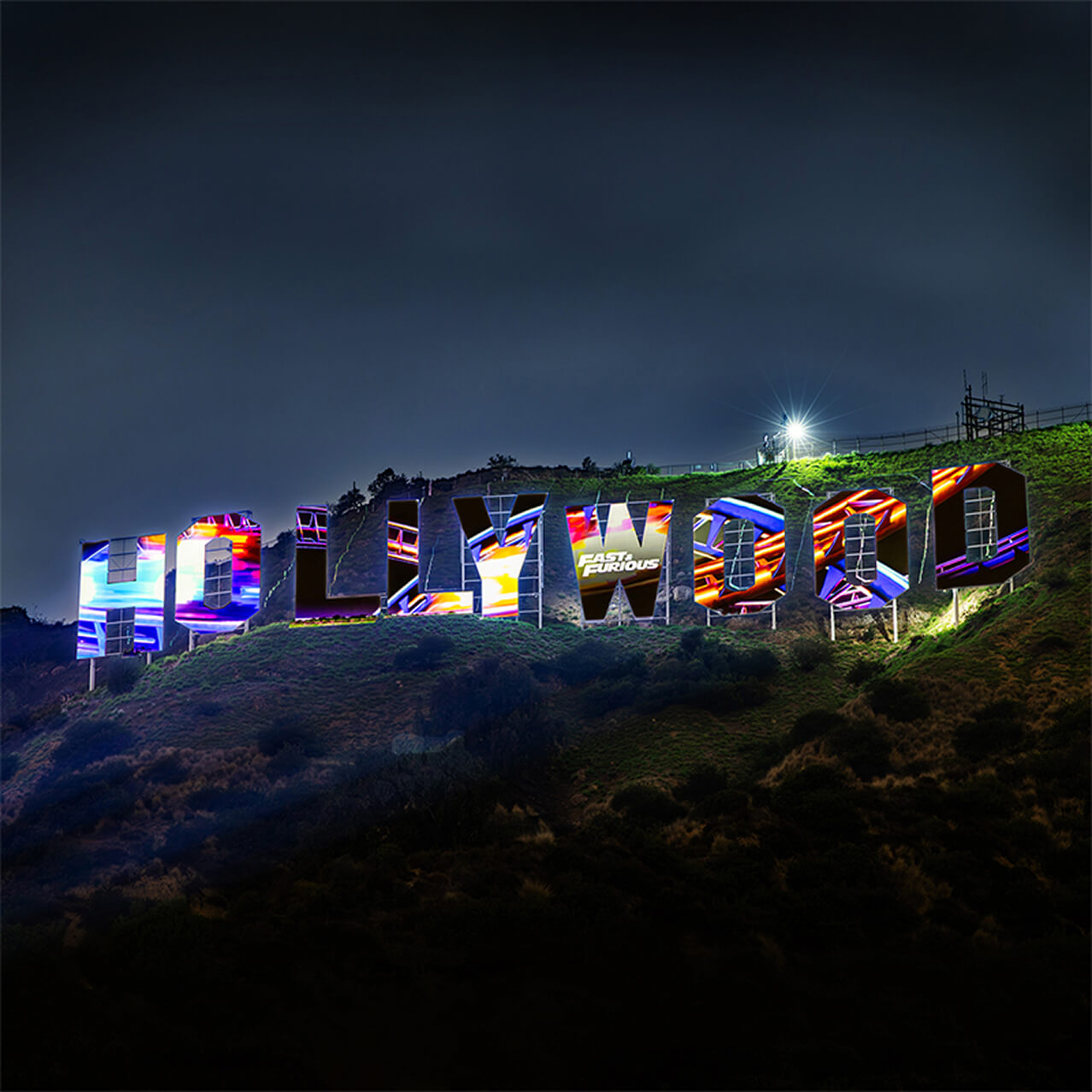 A composition of roller coaster images superimposed into The HOLLYWOOD sign.