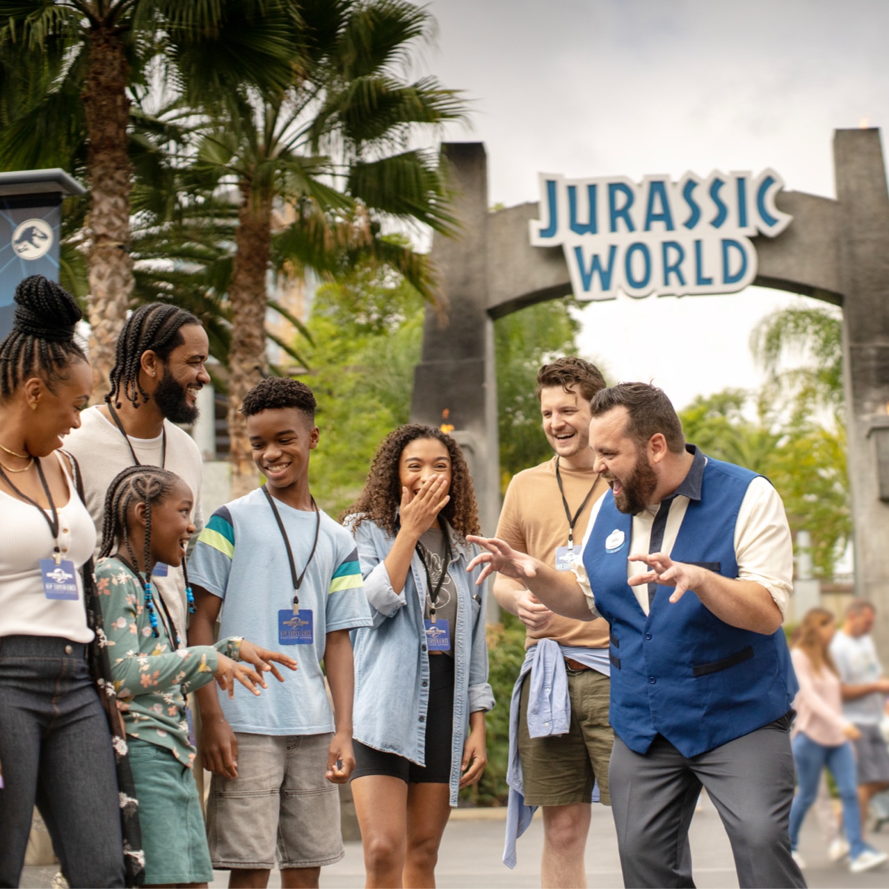Guests laugh and smile with the tour guide on their VIP experience. 
