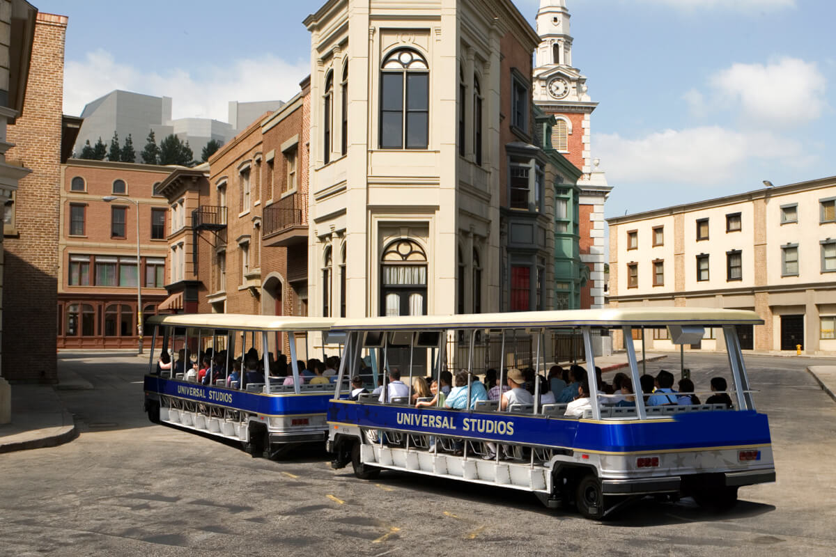 Universal Studios tour trams drive through the backlot on the Studio Tour.