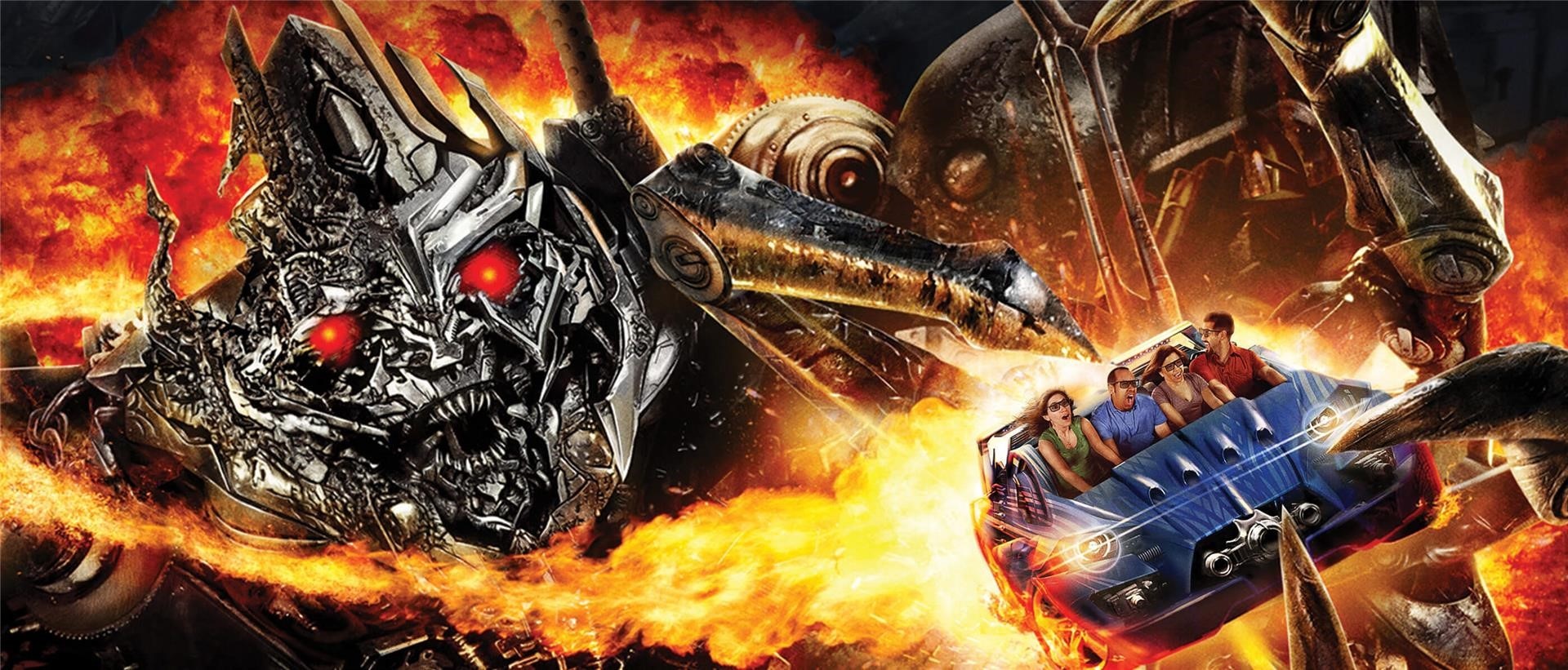 A poster for the Transformer's ride filled with fire and a giant Transformer grabbing at the riders.