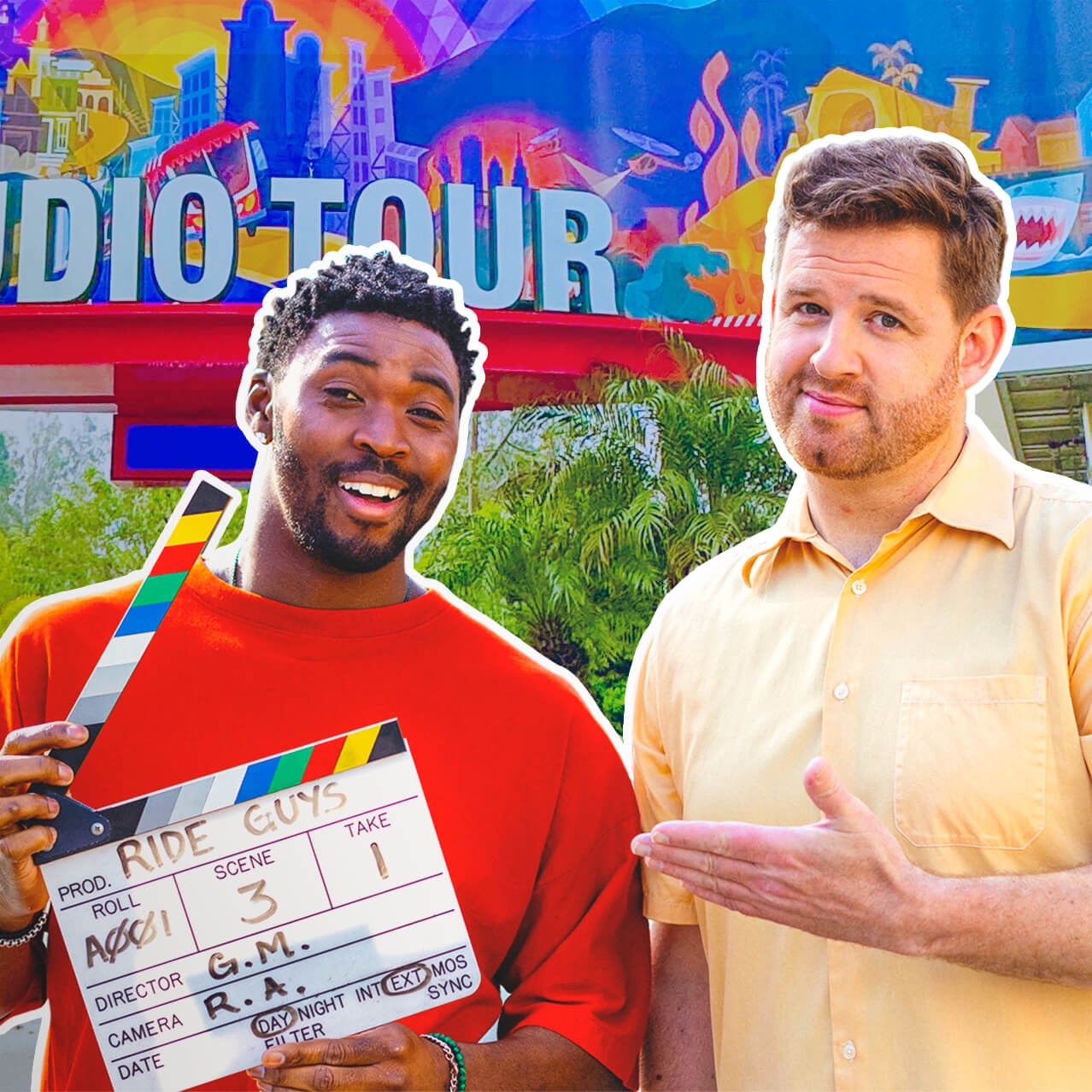 The Ride Guys holding a film clapperboard in front of the entrance to The World-Famous Studio Tour.