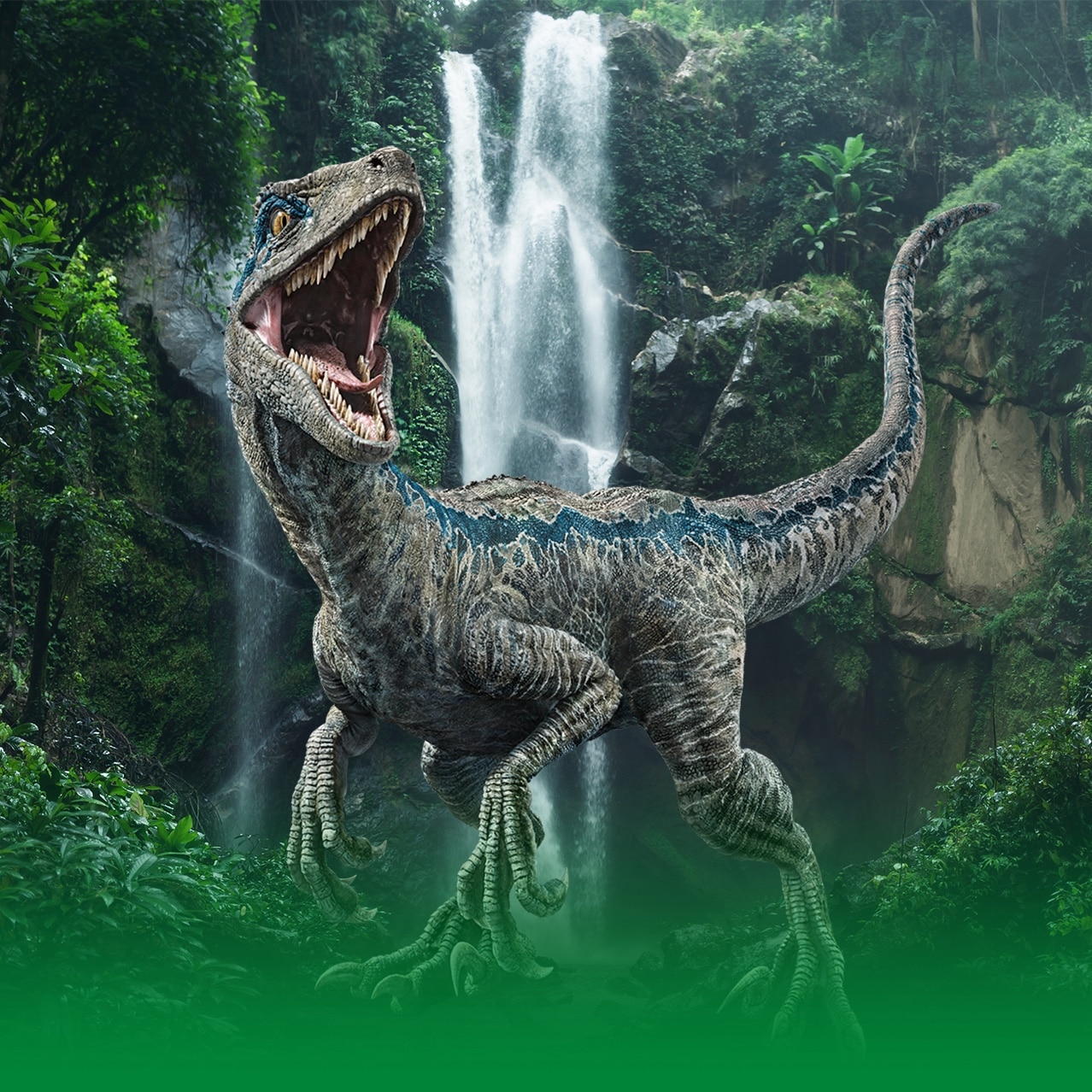 Blue the Velociraptor standing against a jungle waterfall background.