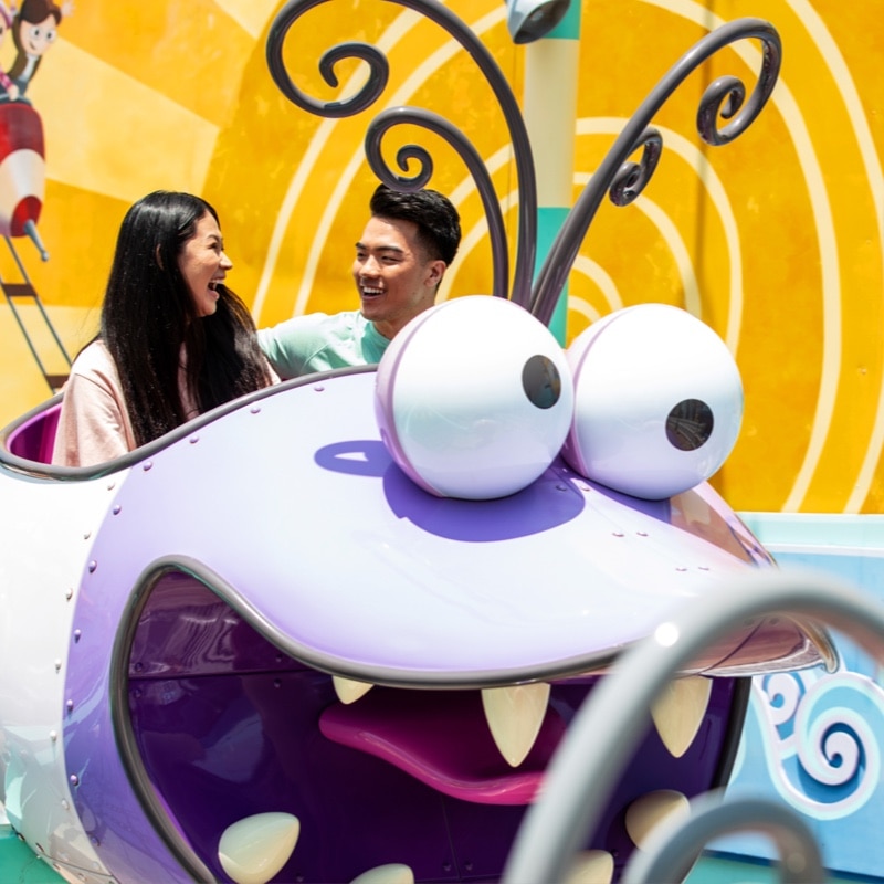 Couple rides the Silly Swirly Fun Ride