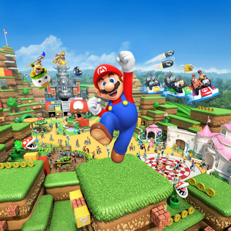 The video game character Mario jumps up, raising his fist in the air high above an illustration of SUPER NINTENDO WORLD™. Bowser's Castle and Princess Peach's Castle are visible in the background, along with a multitude of other characters racing about and flying through the sky.