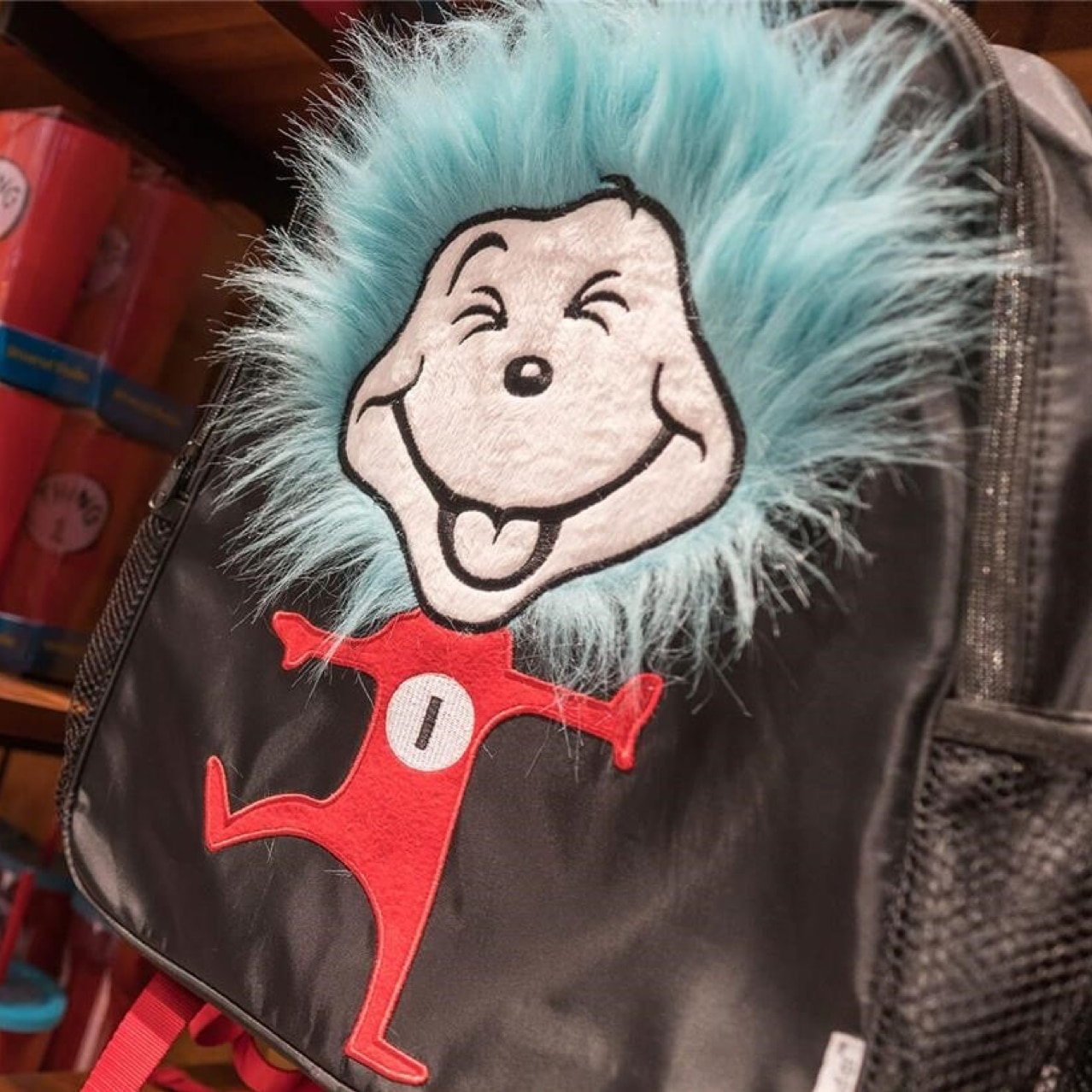 Store's wall full of merchandise of the character Thing 1.